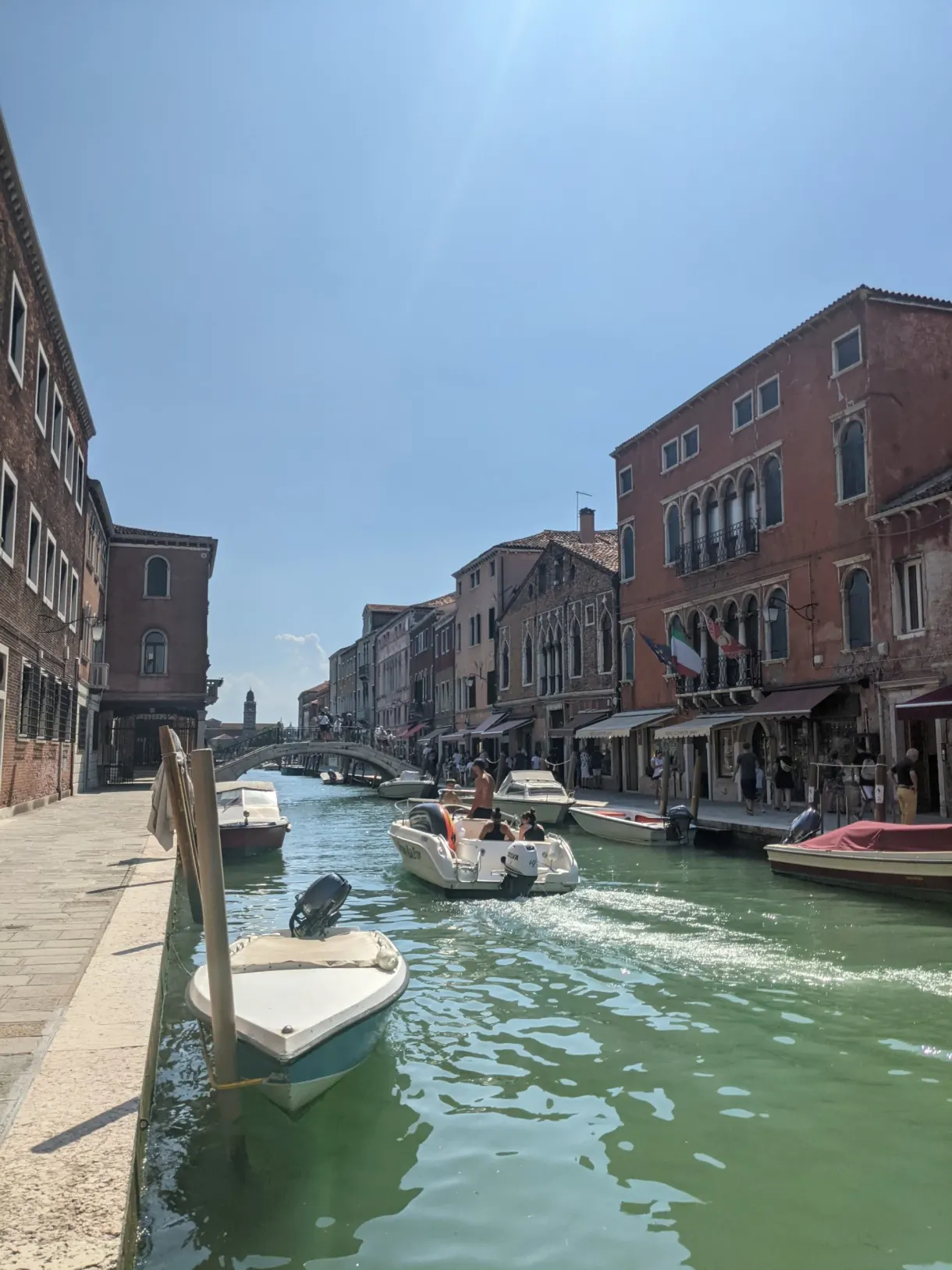 Motorboat heading up the Murano canal
